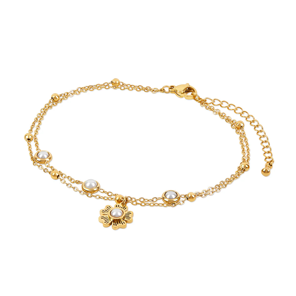 Pearl Anklet - Gold Tone Tone Double Layered with floral charm and pearl accents, crafted in stainless steel with adjustable extender for a secure fit.