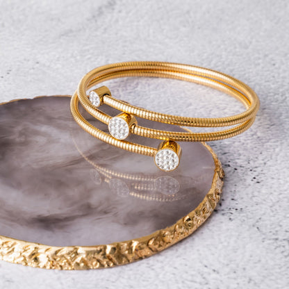 Stone Twister Bangle - Gold Tone