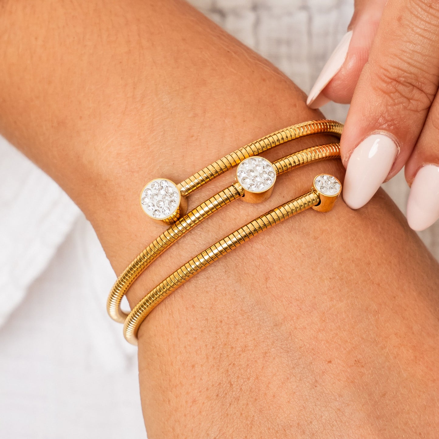 Stone Twister Bangle - Gold Tone
